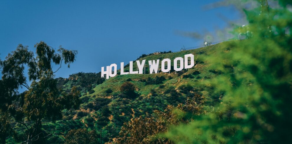 A scenic view of the famous Hollywood sign on a sunny day in Los Angeles.
