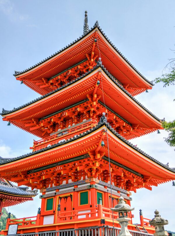 Vibrant pagoda at Kiyomizu-dera temple, a prominent landmark in Kyoto, Japan.